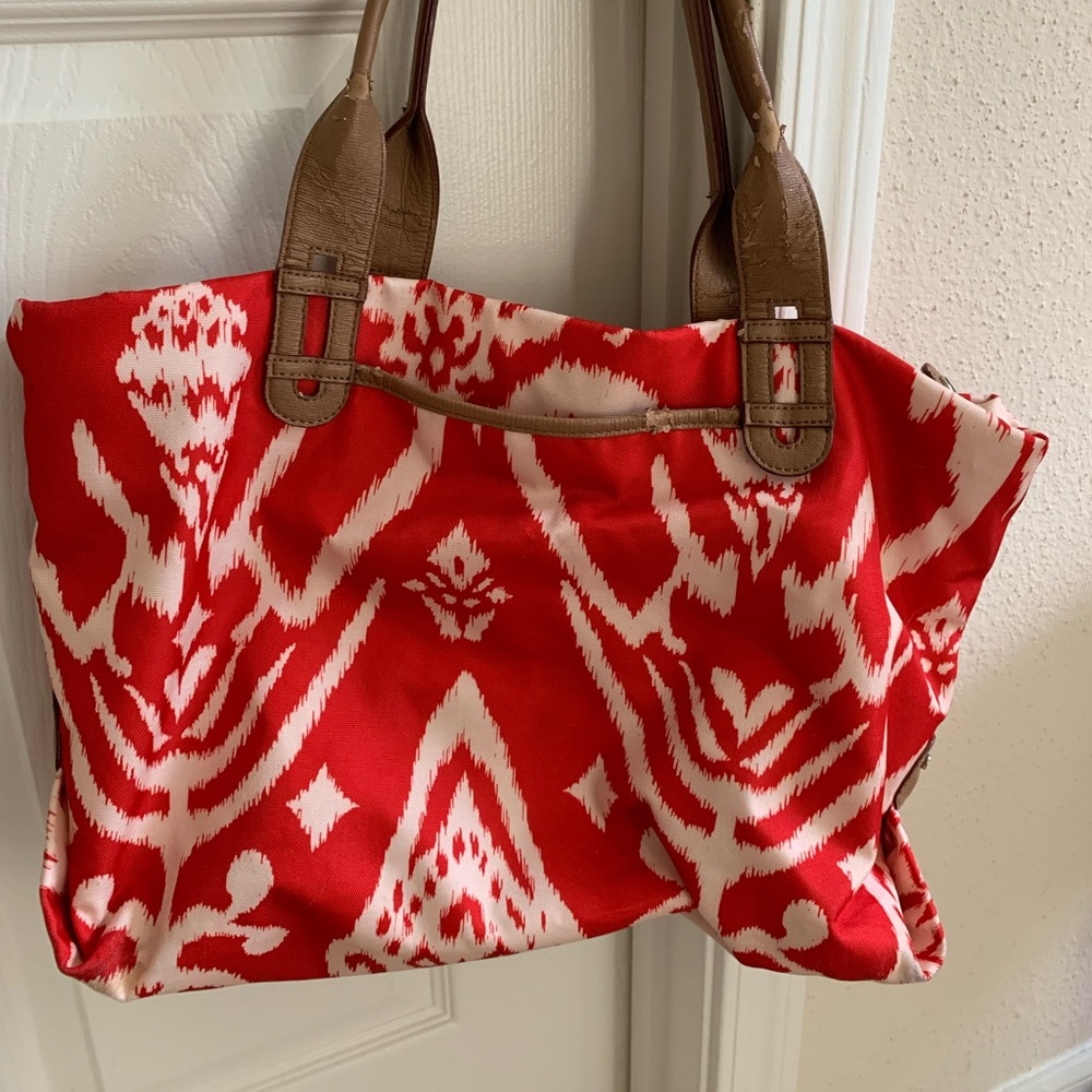 red and white shoulder bag